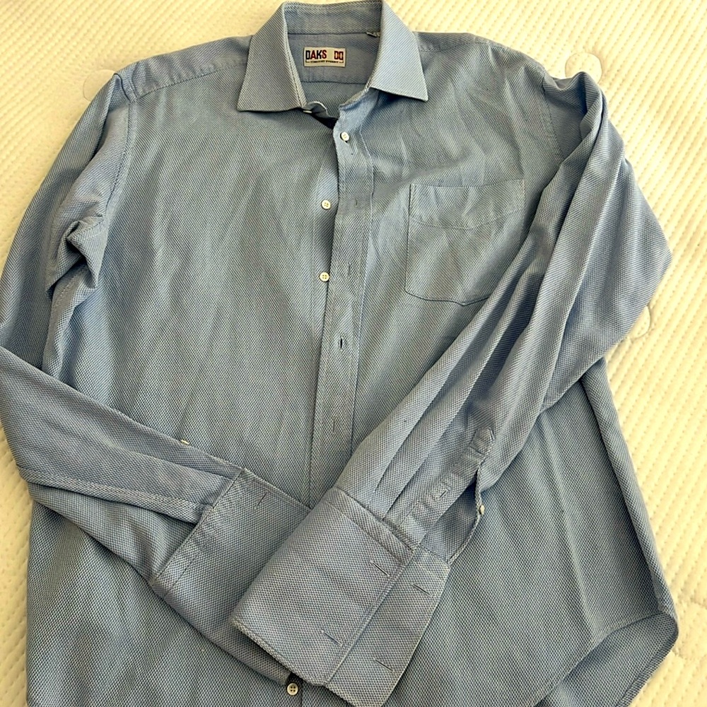 Classic fit long sleeve button down striped shirt in blue and white.